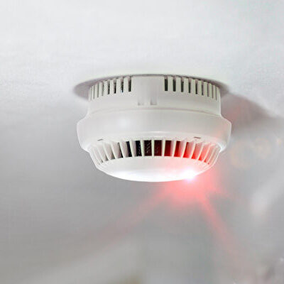 Smoke,Detector,Alert,Mounted,On,Roof,In,Apartment Smoke detector alert mounted on roof in apartment